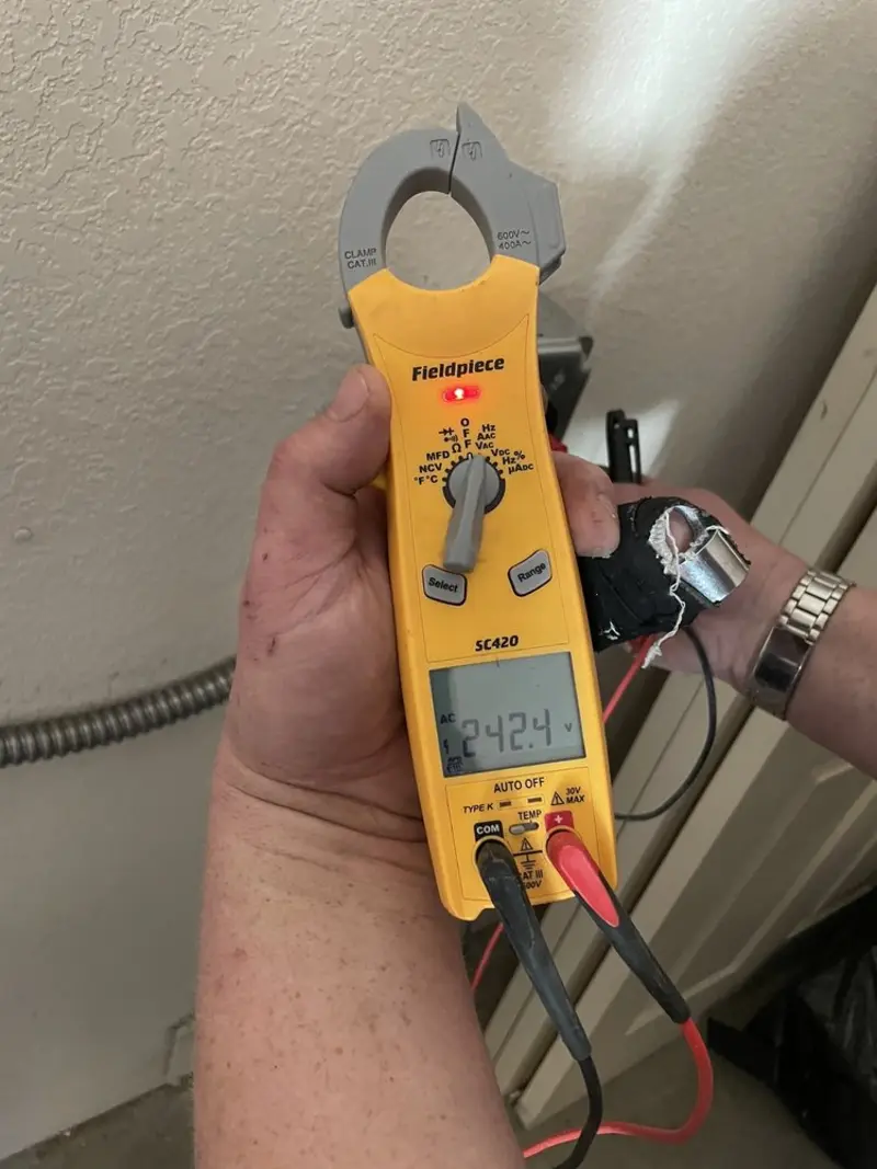 Voltage testing with clamp meter during Generator Installation in Upper Arlington